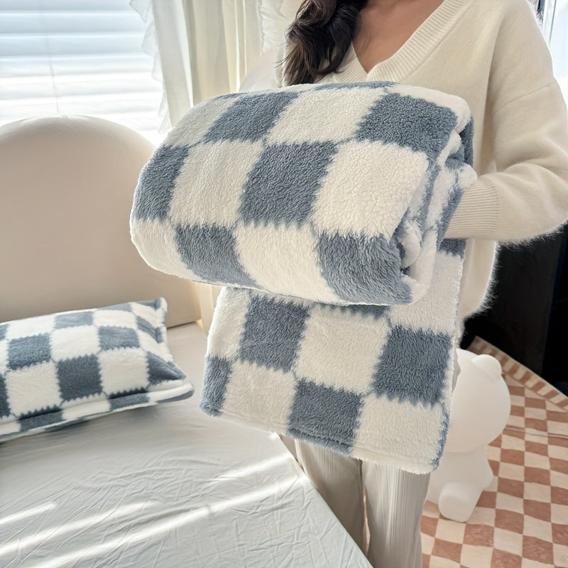 Gezellige flanellen plaid, ideaal voor koude avonden, voegt comfort en warmte toe aan elke ruimte.