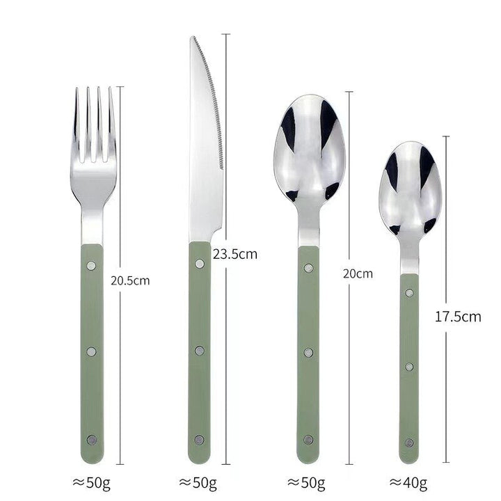 Stijlvolle tafeldecoratie: 24-delige RVS bestekset met verfijnde gravure, perfect voor diner.
