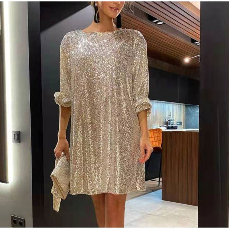 Elegante dames avondjurk: zwarte glitterjurk met ceintuur, ideaal voor feestelijke gelegenheden.