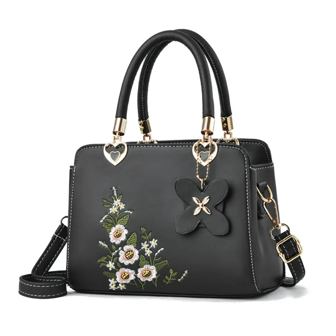 Trendy dames Flora crossbody schoudertas, perfect voor modebewuste vrouwen. Stijlvolle accessoire.