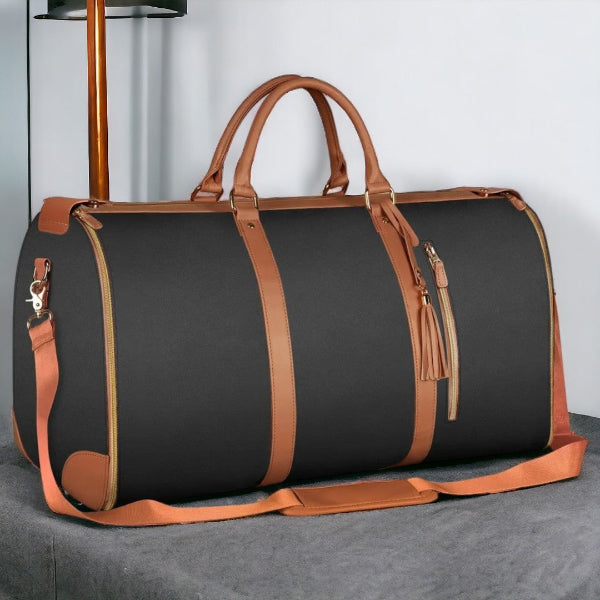 Unisex persoon draagt de stijlvolle vintage Simona reistas over schouder. Ideale reistas voor op reis.