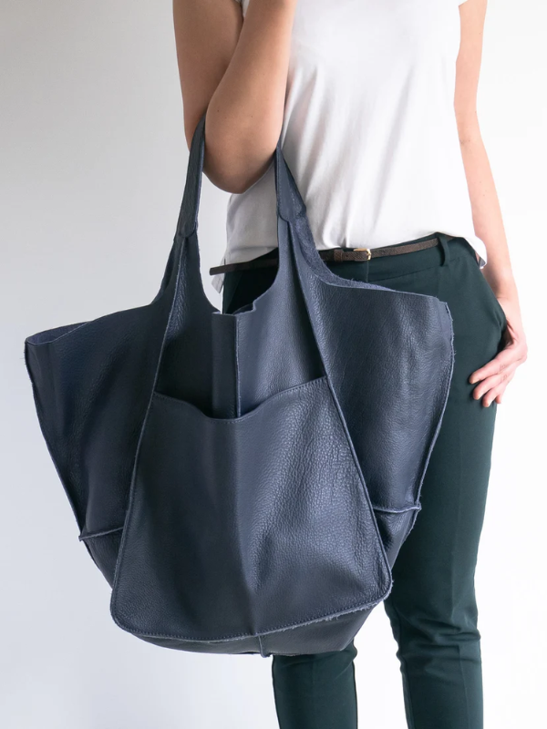 Veelzijdige Maxine strandtas: retro PU-leer voor dames, ideaal voor zomerse dagen.