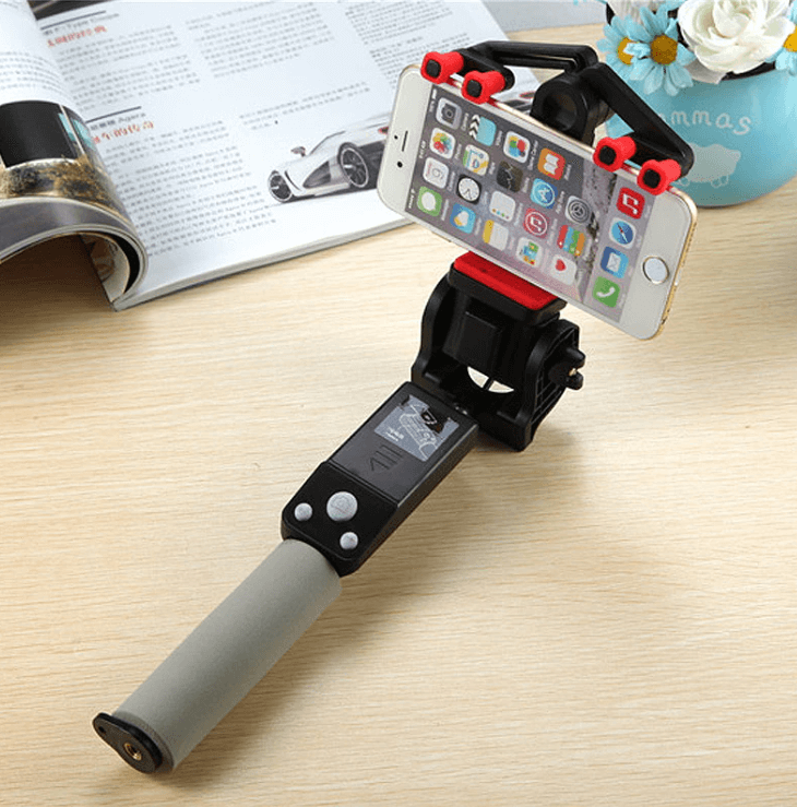 Zwarte 360° draaibare Bluetooth selfie stick, ideaal statief voor stabiele smartphone opnames.