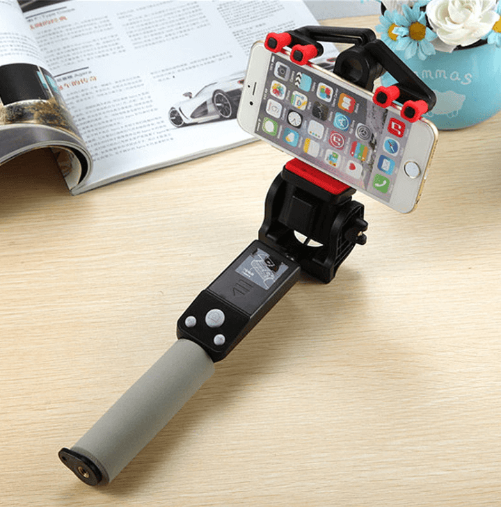 Zwarte 360° draaibare Bluetooth selfie stick, ideaal statief voor stabiele smartphone opnames.