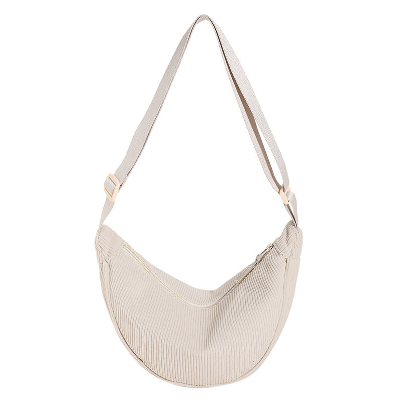 Chique geribbelde halve maan schoudertas voor dames. Elegant en veelzijdig, ideaal als crossbody.