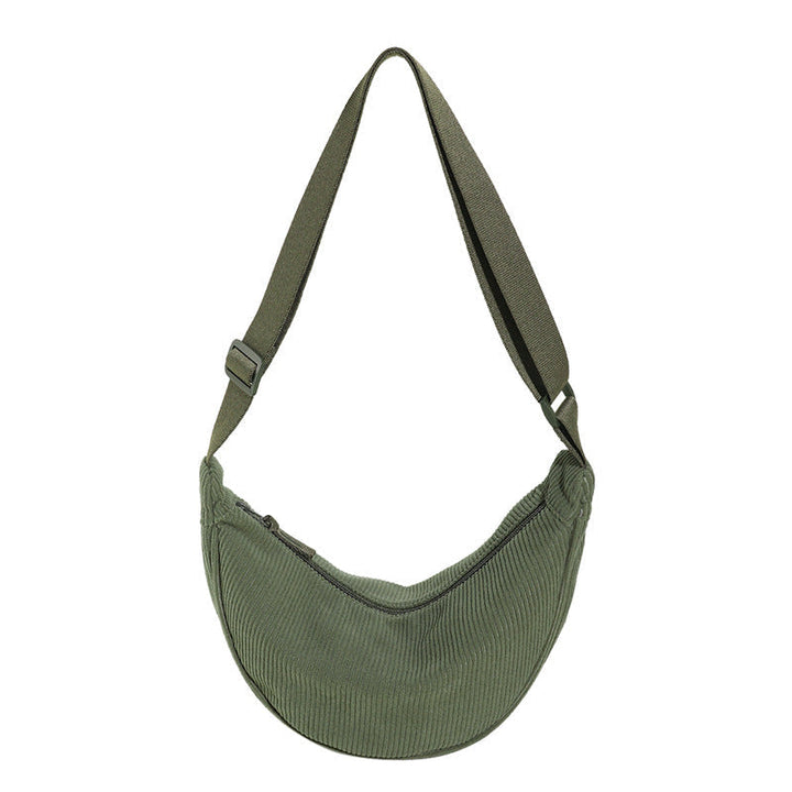 Trendy dames halve maan tas met geribbelde textuur. Stijlvolle schoudertas voor modebewuste vrouw.