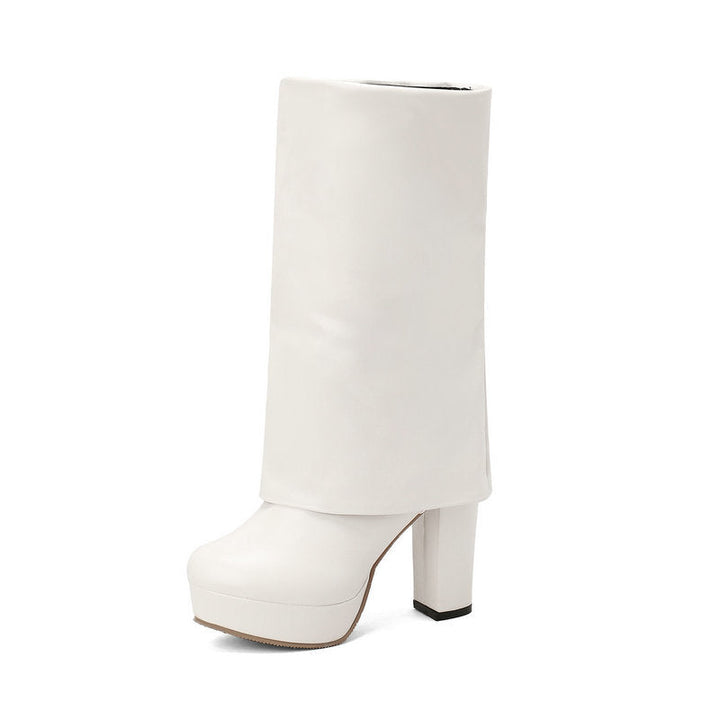 Halfhoge dameslaarzen met plateauzool en blokhak, ontworpen voor comfort en een elegante, tijdloze uitstraling.