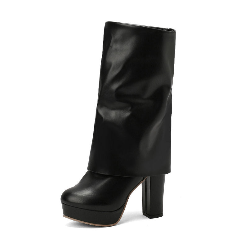 Stevige dameslaarzen met plateauzool en blokhak voor optimale stabiliteit; comfortabele schacht, perfect voor wintermode.
