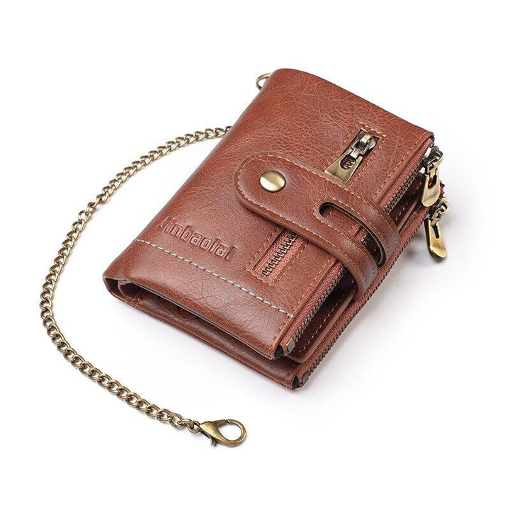 Zwarte leren retro portemonnee met robuuste ketting, perfect voor pasjes en een stoere look.