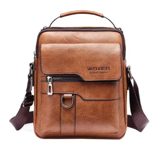Compacte maar ruime leren schoudertas voor dames, een onmisbaar dagelijks accessoire.