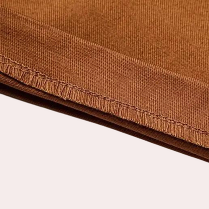 "Bruine cargo overall voor mannen met zijzakken, comfortabele pasvorm en ademend materiaal, perfect voor zomer en werk."