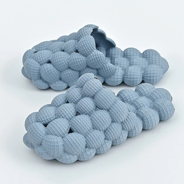 Stevige anti-slip bubbel slippers; duurzaam, comfortabel en ideaal voor langdurig gebruik.