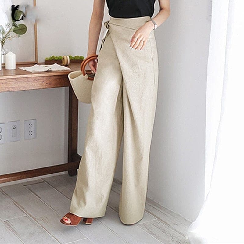 Stijlvolle hooggetailleerde dames zomerbroek met wijde pijpen en elegant wikkeldetail voor comfort en klasse.