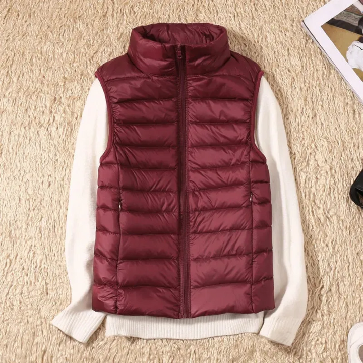 Zwarte dames winddichte bodywarmer met ritssluiting, comfortabel en warm voor winterse outfits.