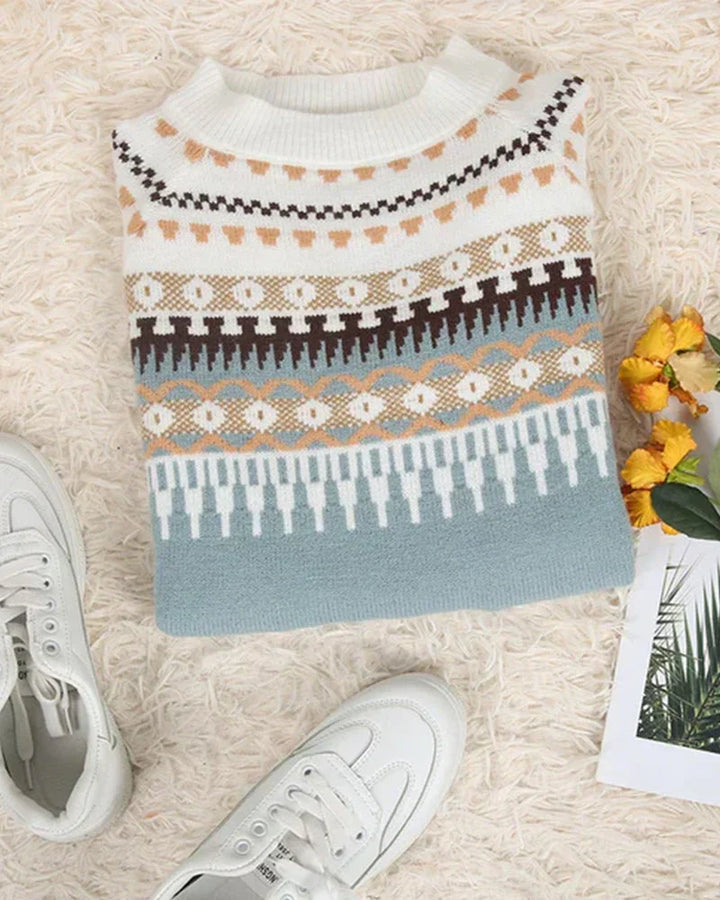 Trendy casual winterkleding: dames trui met lange mouwen en modieuze print.