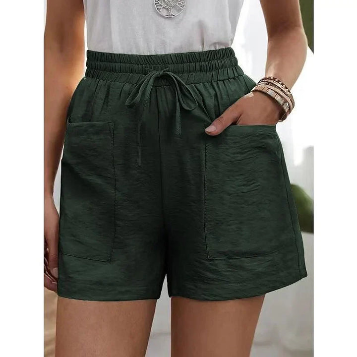 Dames korte broek met hoge taille en elastische band. Comfortabel, veelzijdig en perfect als zomerkleding.