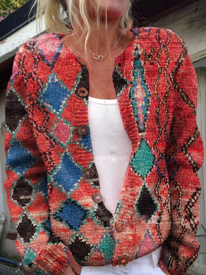 Dames cardigan met levendige bloemenprint en knopen, perfect te combineren voor een frisse lente outfit.