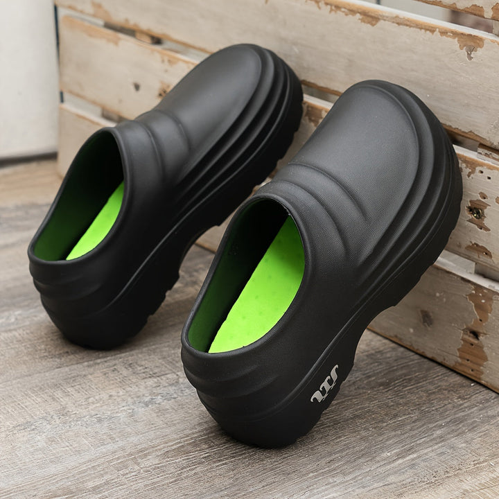 Unisex orthopedische AquaStep clogs, waterdicht voor comfort en voetondersteuning.