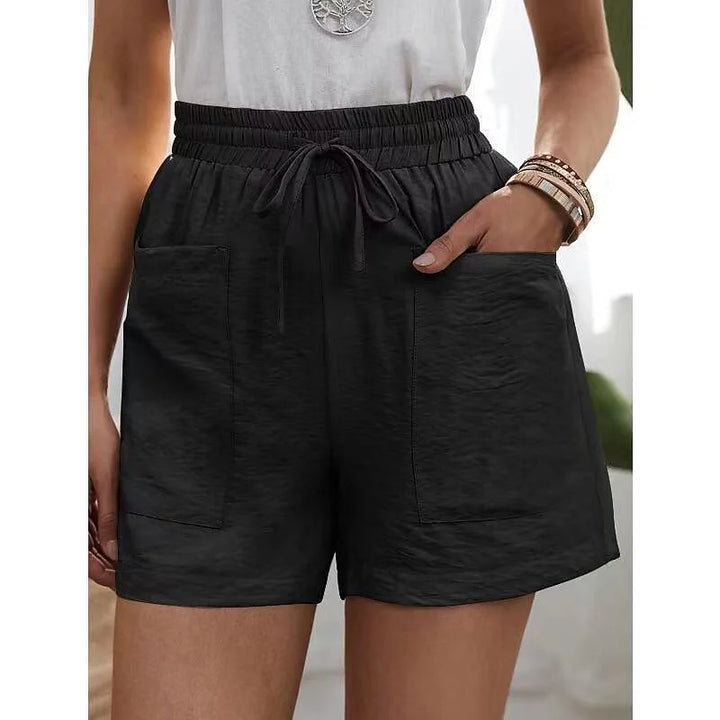 Modieuze dames shorts, hoge taille met elastische band. Essentiële zomerkleding, comfortabel en stijlvol.