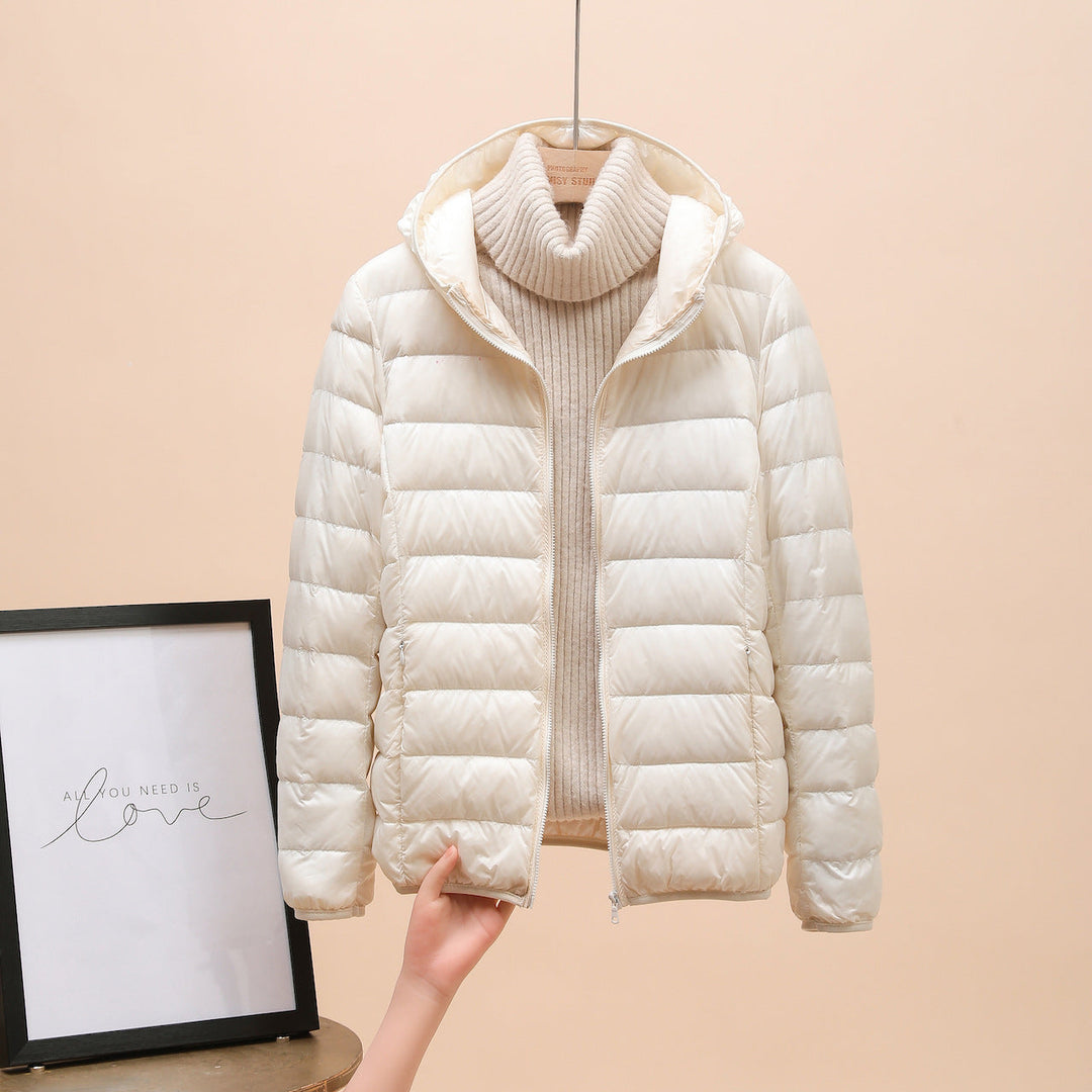 Veelzijdige lichtgewicht capuchonjas voor dames, stijlvol, comfortabel en geschikt voor outdoor en dagelijks gebruik.