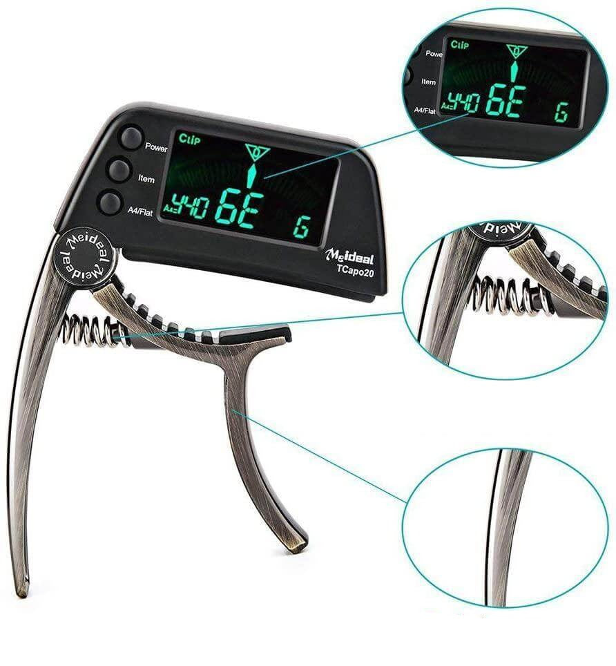 TuneGrip 2-in-1 gitaar capo en chromatische tuner voor nauwkeurig stemmen en spelen van je instrument.