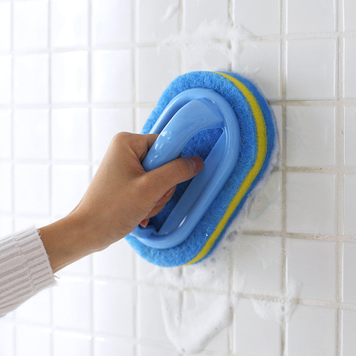 Huishoudelijke schoonmaakspons met stevig handvat voor effectieve reiniging van keuken en badkamer.