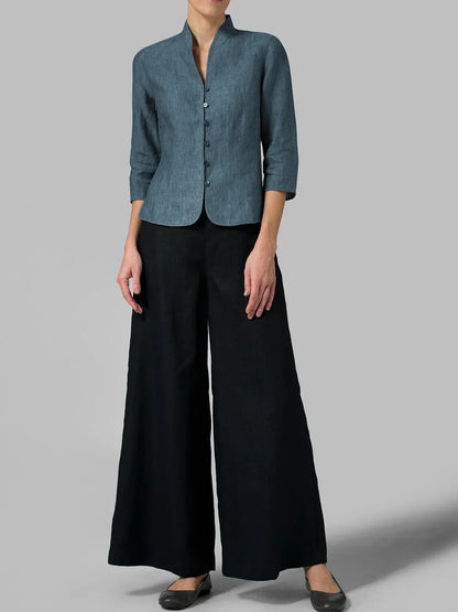 "Carmencita damesblouse, elegante hoge kraag, getailleerde pasvorm, zachte stof, geschikt voor zakelijke en casual looks."