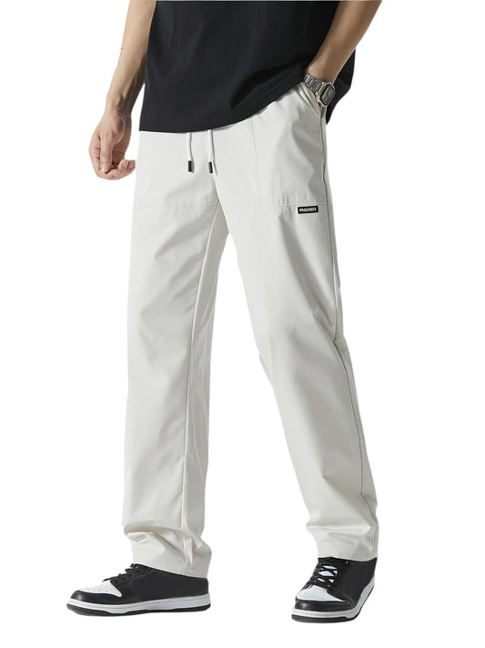 "Casual chique heren joggingbroek, donkergrijs, ademende stof, elastische tailleband met trekkoord, comfortabele pasvorm."