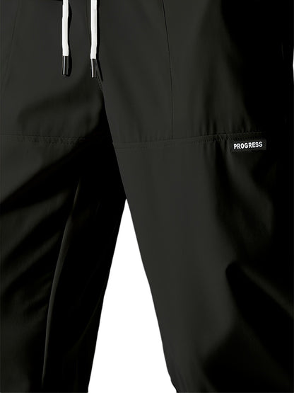 "Casual chique heren joggingbroek, donkergrijs, ademende stof, elastische tailleband met trekkoord, comfortabele pasvorm."