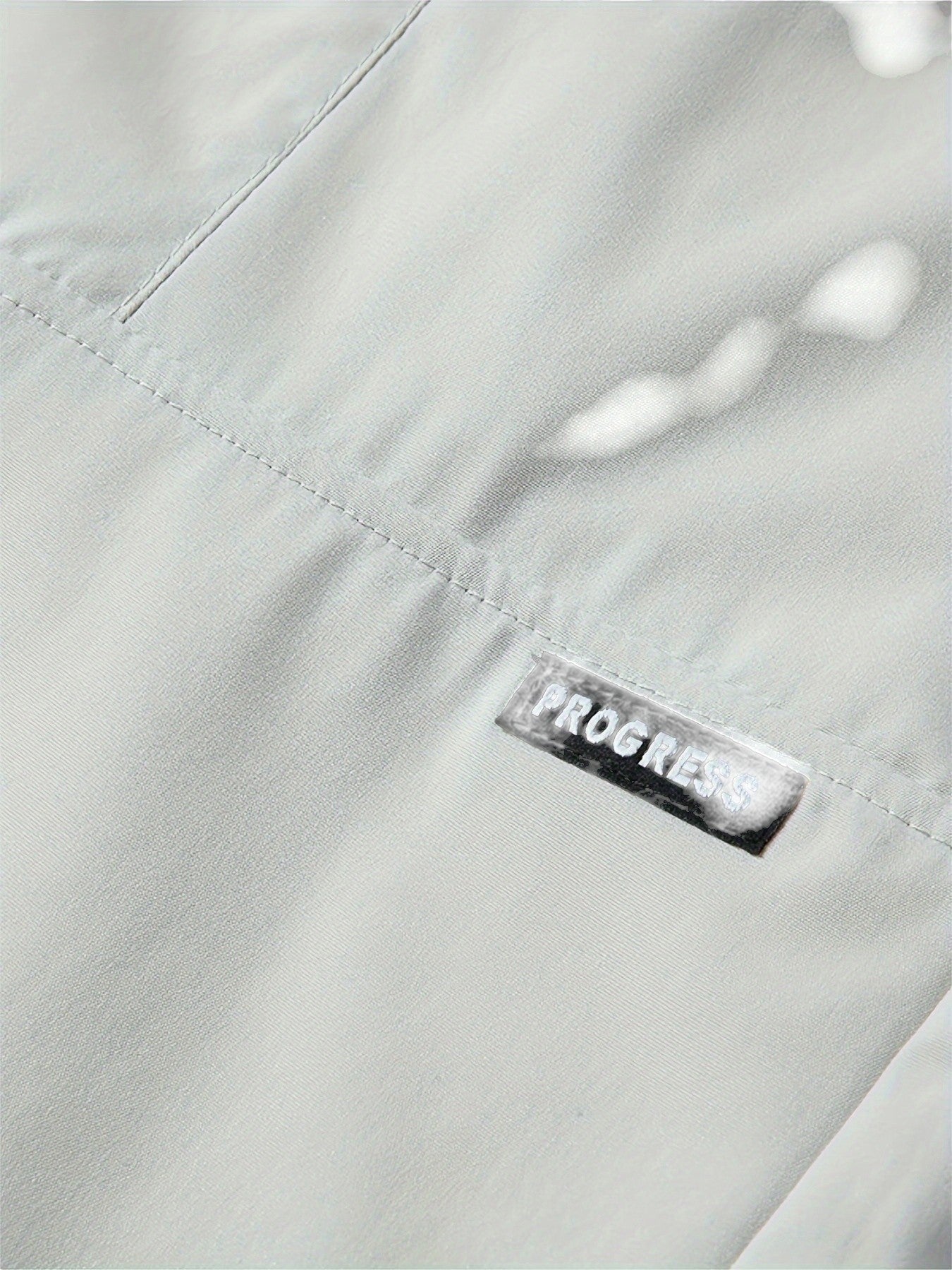 "Casual chique heren joggingbroek, donkergrijs, ademende stof, elastische tailleband met trekkoord, comfortabele pasvorm."