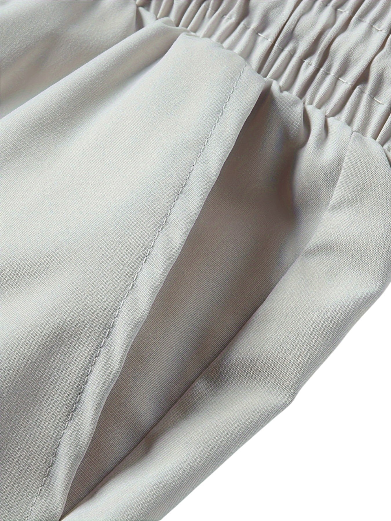 "Casual chique heren joggingbroek, donkergrijs, ademende stof, elastische tailleband met trekkoord, comfortabele pasvorm."