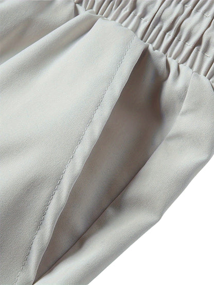"Casual chique heren joggingbroek, donkergrijs, ademende stof, elastische tailleband met trekkoord, comfortabele pasvorm."
