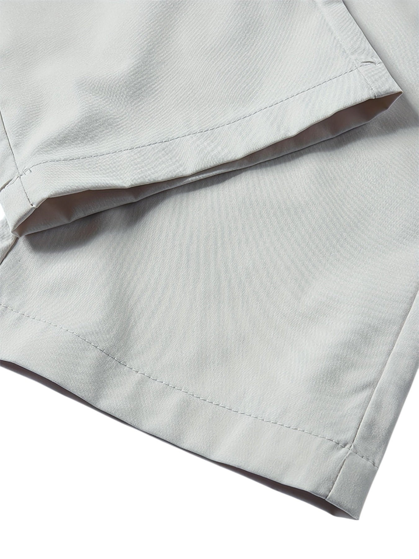 "Casual chique heren joggingbroek, donkergrijs, ademende stof, elastische tailleband met trekkoord, comfortabele pasvorm."