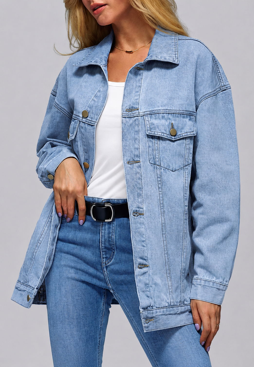 Dames oversized lange spijkerjas in trendy marineblauw met klepzakken, perfect voor casual herfst- en lentelooks.