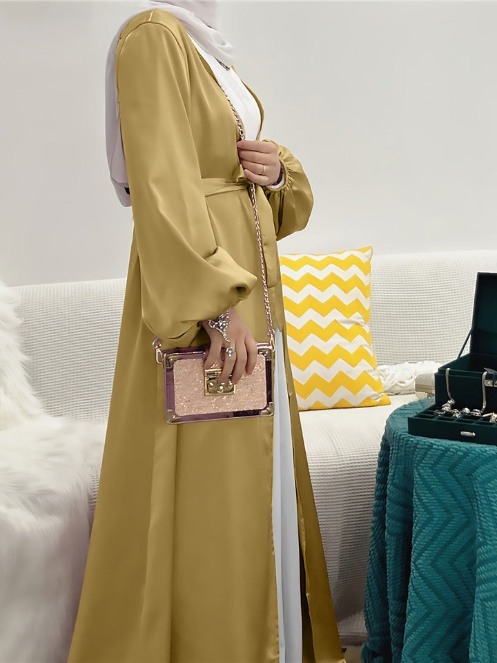 Casual maar verfijnde abaya jurk met riem voor dames. Comfortabele en elegante lange jurk voor elke dag.