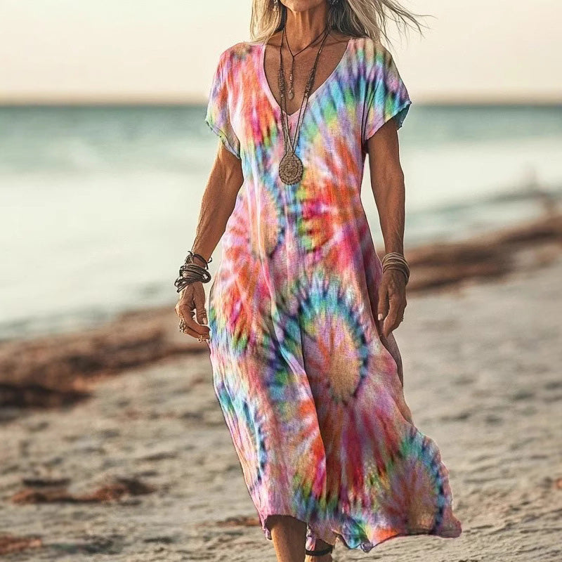 Luchtige dames zomerjurk met stijlvolle vlinderprint. Perfect als strandjurk, vakantiejurk of casual outfit.