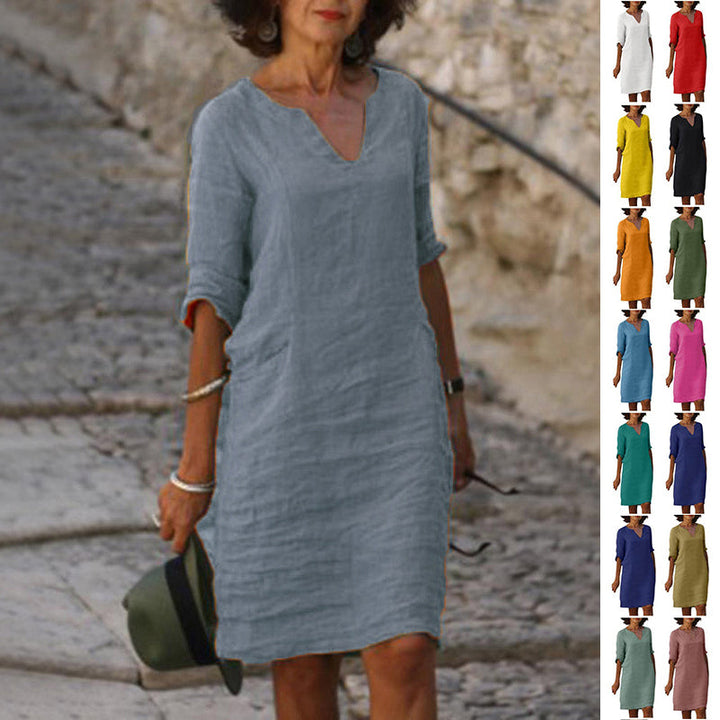 Dames vintage midi-jurk met korte mouwen, tijdloze elegantie en A-lijn model. Perfecte retro zomerjurk.