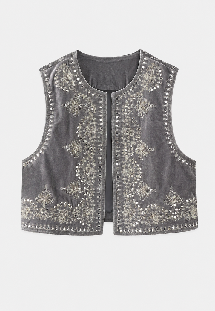 Elegant fluwelen damesvest met prachtig bloemenborduurwerk, voor een modieuze uitstraling in het tussenseizoen.