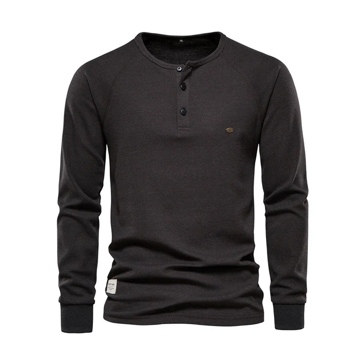 Dagelijks herenshirt met lange mouwen, ronde hals. Stijlvol en comfortabel, essentieel voor herenmode.
