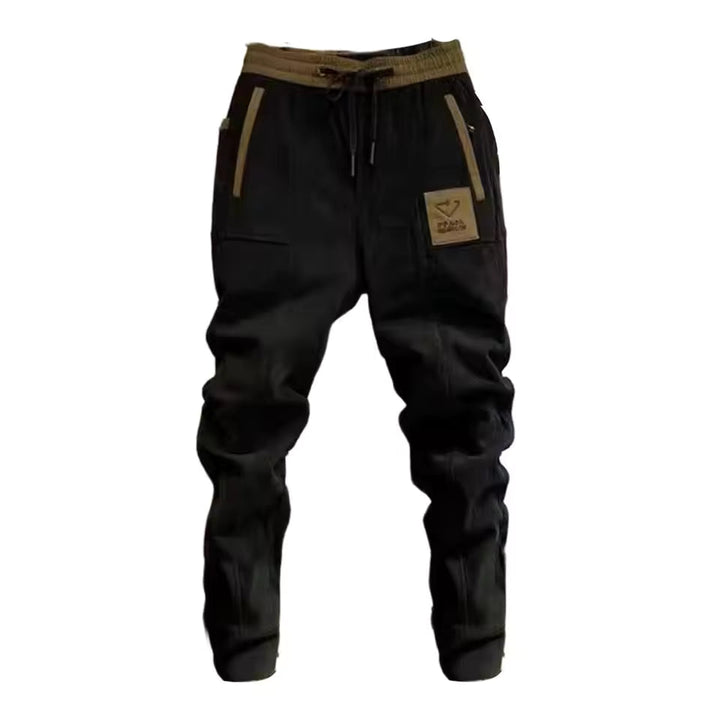 Moderne heren corduroy cargo joggingbroek in grijs, perfect voor streetwear en casual comfort.