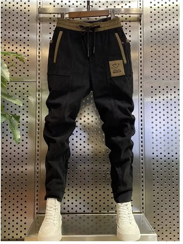 Grijze heren corduroy joggingbroek, comfortabele streetwear joggers met cargo zakken voor casual stijl.