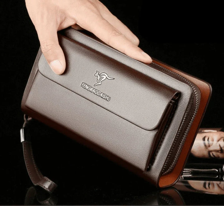 Zwarte leren heren portemonnee met polsbandje. Luxe accessoire voor de moderne man.