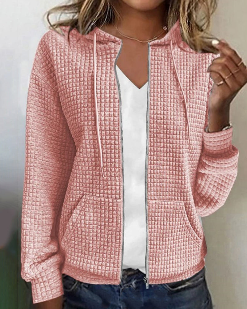 "Comfortabel damesvest met zakken en trekkoord in katoenmengsel, geschikt voor casual warme stijl."