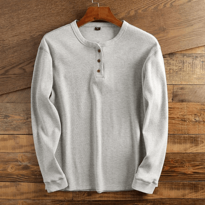 "Comfortabel Henley shirt met wafelstructuur voor heren. Stijlvol, ademend en perfect voor elke gelegenheid."
