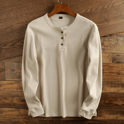 "Comfortabel Henley shirt met wafelstructuur voor heren. Stijlvol, ademend en perfect voor elke gelegenheid."