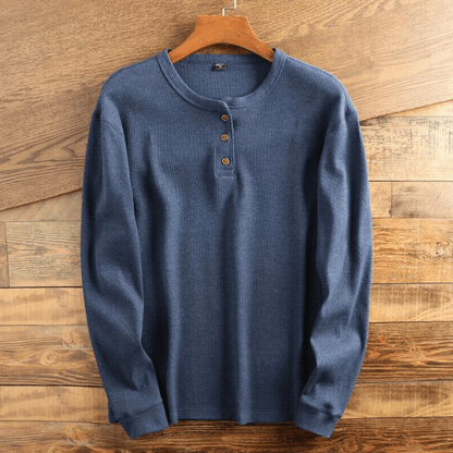 "Comfortabel Henley shirt met wafelstructuur voor heren. Stijlvol, ademend en perfect voor elke gelegenheid."