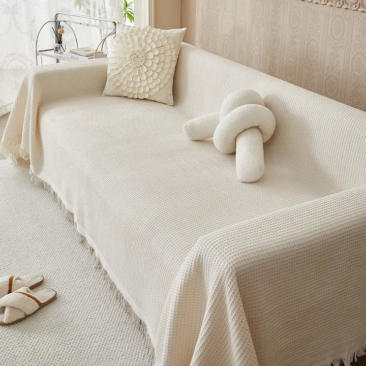 Wasbare, huisdierbestendige ComfortWeave bankhoes (beige/khaki). Duurzaam polyester katoen voor optimale bankbescherming.