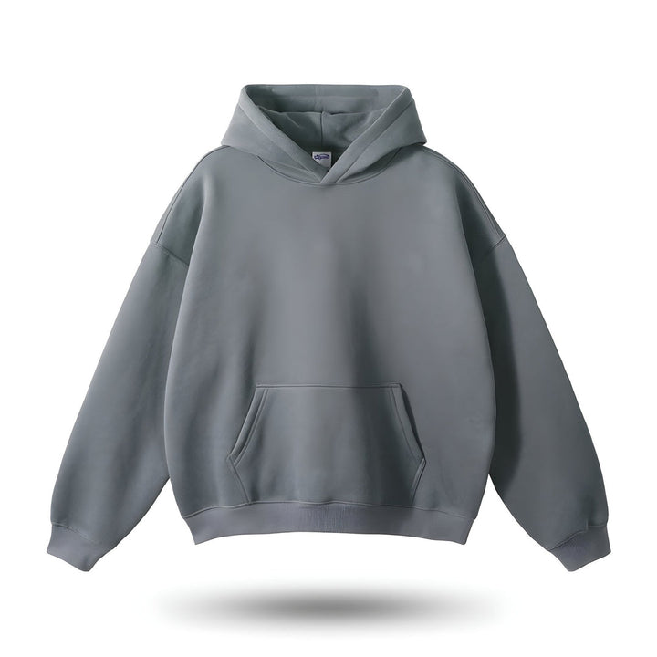 Trendy heren oversized hoodie met kangoeroezakken in grijs. Comfortabele streetwear met relaxte pasvorm.