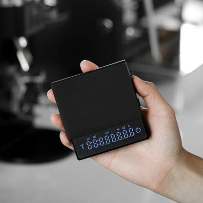 Compacte digitale koffie weegschaal, slank ontwerp, hoge precisie tot 0,1g, ideaal voor barista's en koffie liefhebbers.