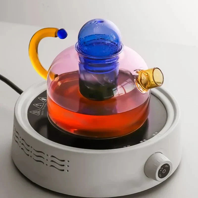 Set van drie glazen mokken in roze, blauw & grijs, passend bij de elegante waterketel/theepot.